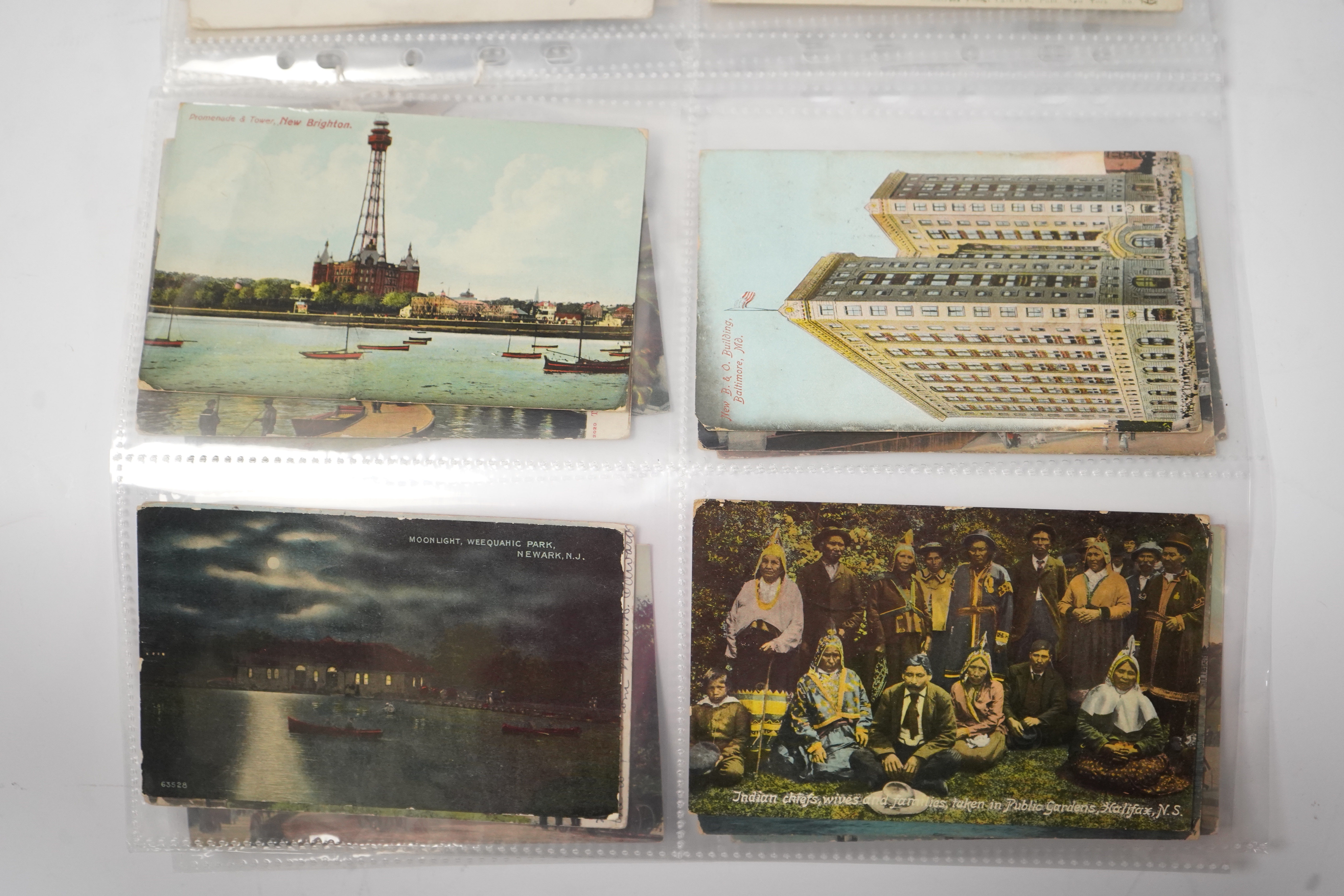 A group of eighty eight assorted vintage postcards, including American topography, rail accidents and motoring.